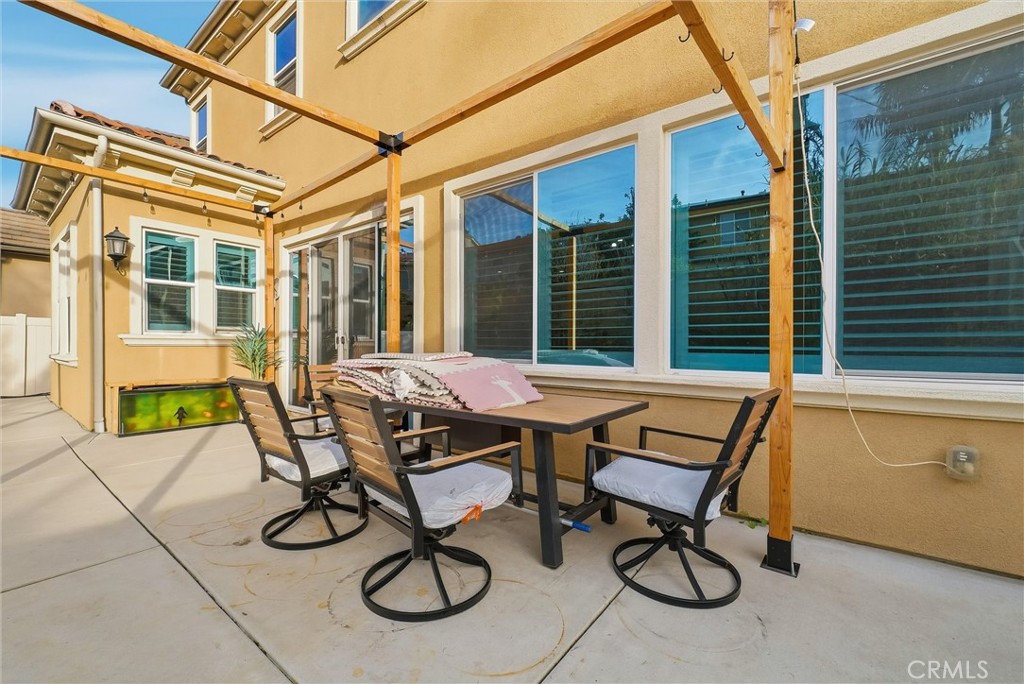 15828 Kingston Road Chino Hills, CA 91709 - Photo 29 of 33 a view of patio with couple of chairs and a table
