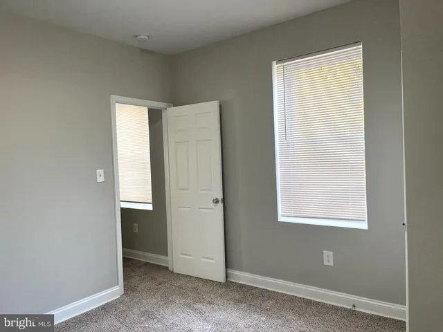 a view of an empty room with window