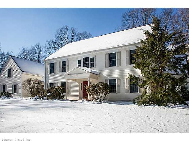 77 Mill Road Madison, CT 06443 - Photo 1 of 1 a front view of a house with a yard
