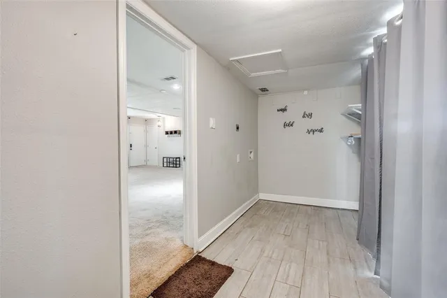 a view of entryway with bathroom