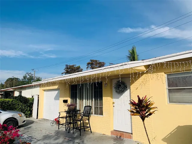a view of a porch with seating space
