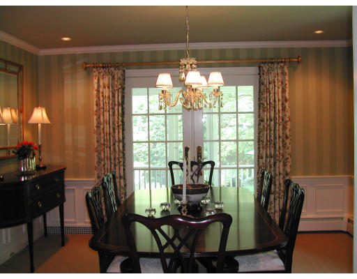 15 Old Colony Road Wellesley, MA 02481 - Photo 5 of 15 a view of a livingroom with furniture and a window