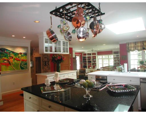 15 Old Colony Road Wellesley, MA 02481 - Photo 6 of 15 a kitchen with a refrigerator a stove a sink and a microwave
