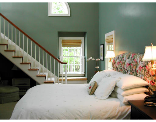 15 Old Colony Road Wellesley, MA 02481 - Photo 8 of 15 a bedroom with a bed and a large window