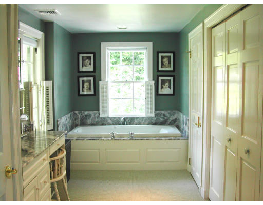 15 Old Colony Road Wellesley, MA 02481 - Photo 9 of 15 a bathroom with a bathtub and a shower
