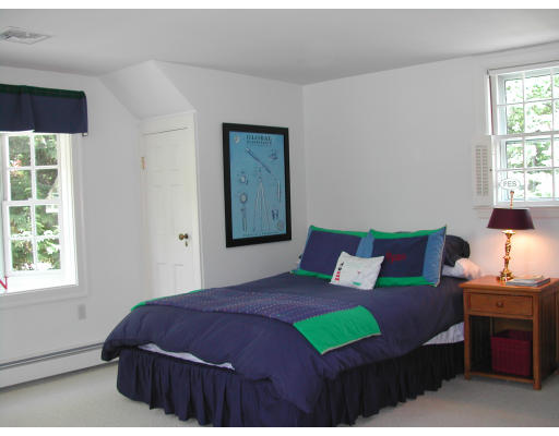 15 Old Colony Road Wellesley, MA 02481 - Photo 10 of 15 a bedroom with a bed and a window