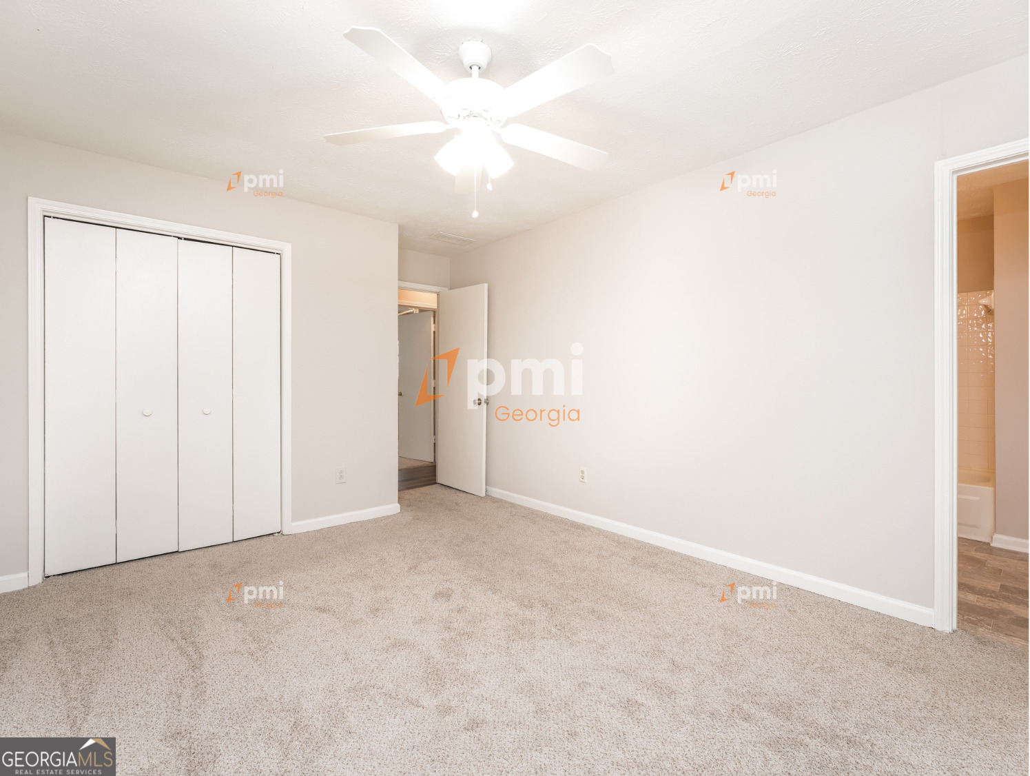 667 Rae Drive Southwest Lawrenceville, GA 30044 - Photo 10 of 19 a view of an empty room