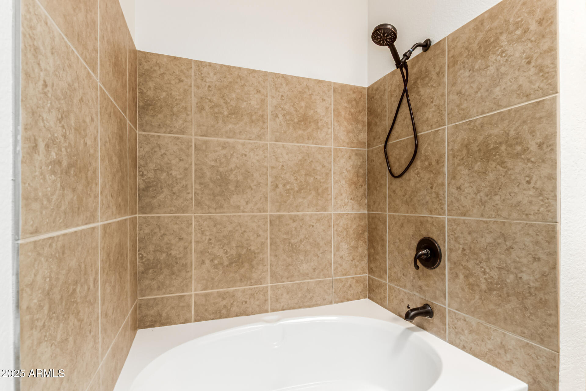 768 South Martinique Drive Gilbert, AZ 85233 - Photo 20 of 27 a bathroom with a bath tub with a shower