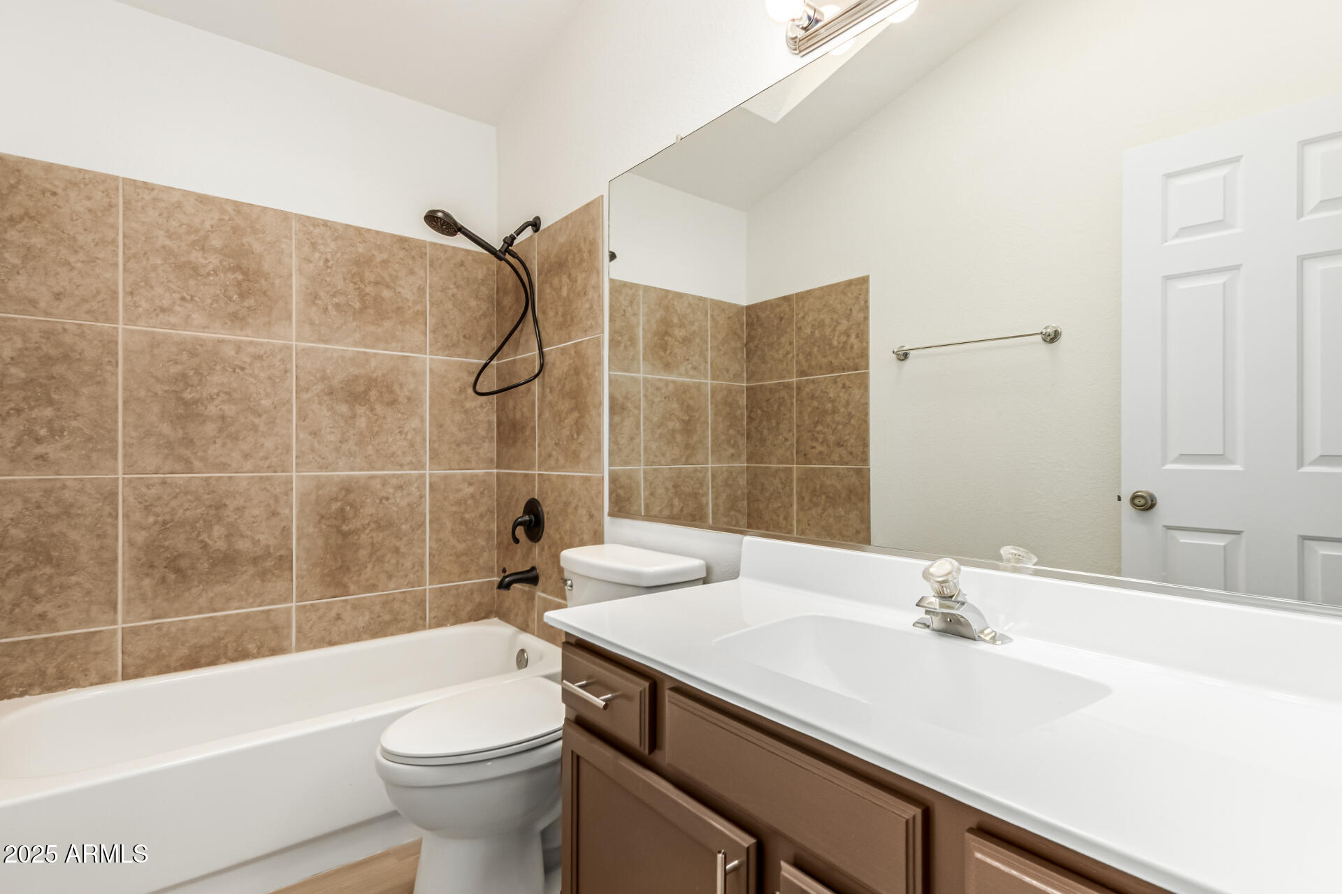 768 South Martinique Drive Gilbert, AZ 85233 - Photo 21 of 27 a bathroom with a sink toilet vanity and shower