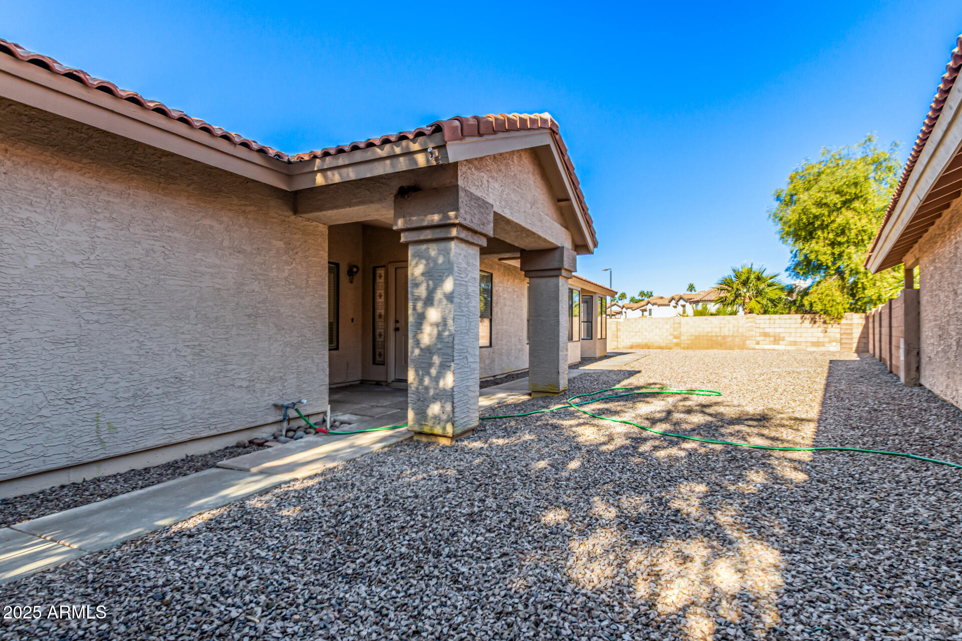 768 South Martinique Drive Gilbert, AZ 85233 - Photo 27 of 27 a view of a house with a yard