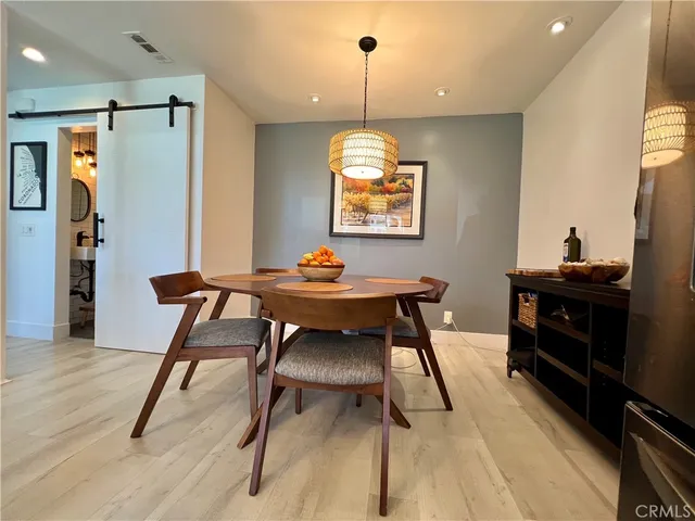 a view of a dining room with furniture