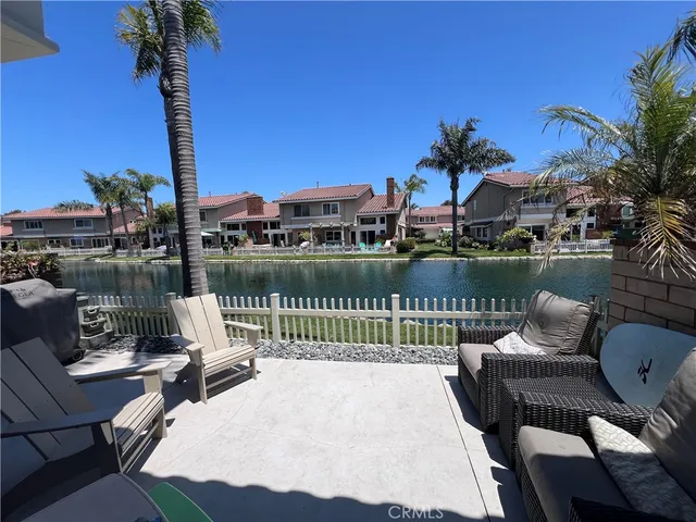 a view of a patio with couches chairs and a table