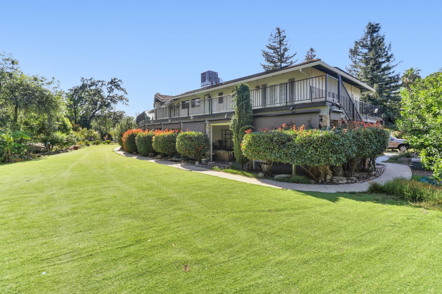4330 Cavitt Stallman Road Granite Bay, CA 95746 - Photo 51 of 85 a front view of a house with a yard