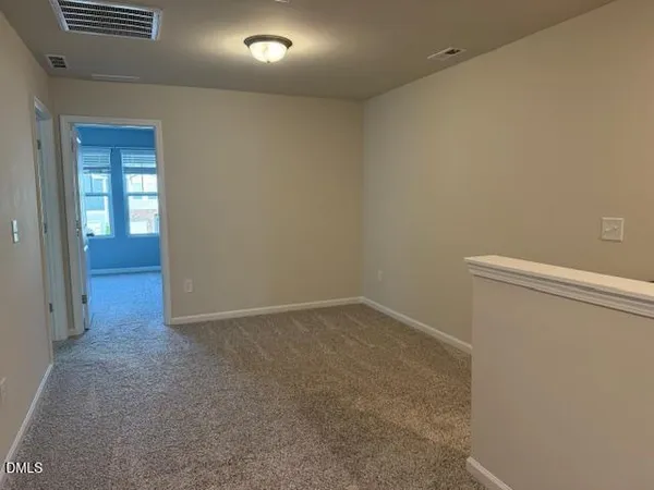 an empty room with window