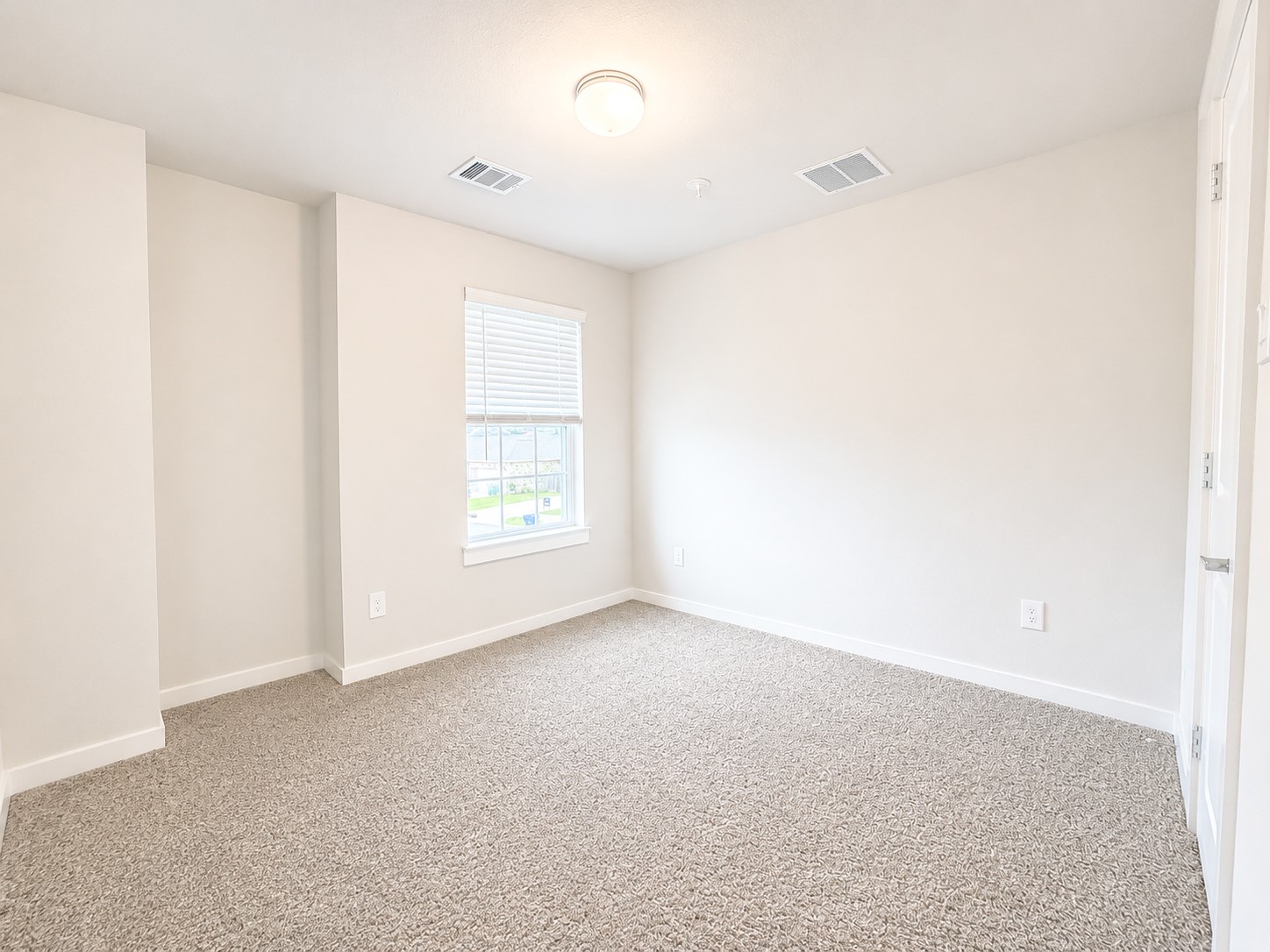 323 Bennett Street Angleton, TX 77515 - Photo 15 of 21 an empty room with windows