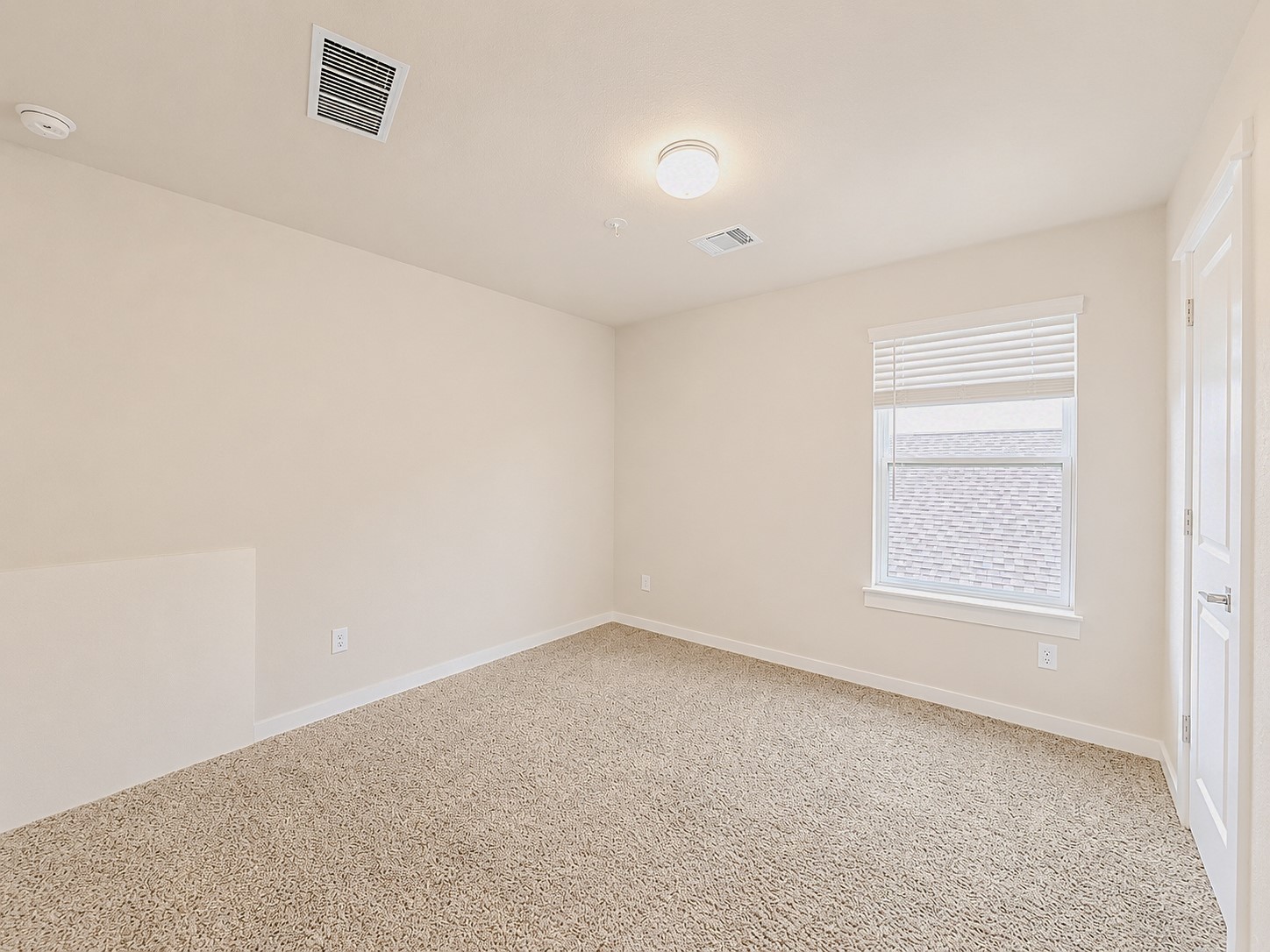 323 Bennett Street Angleton, TX 77515 - Photo 19 of 21 an empty room with a window