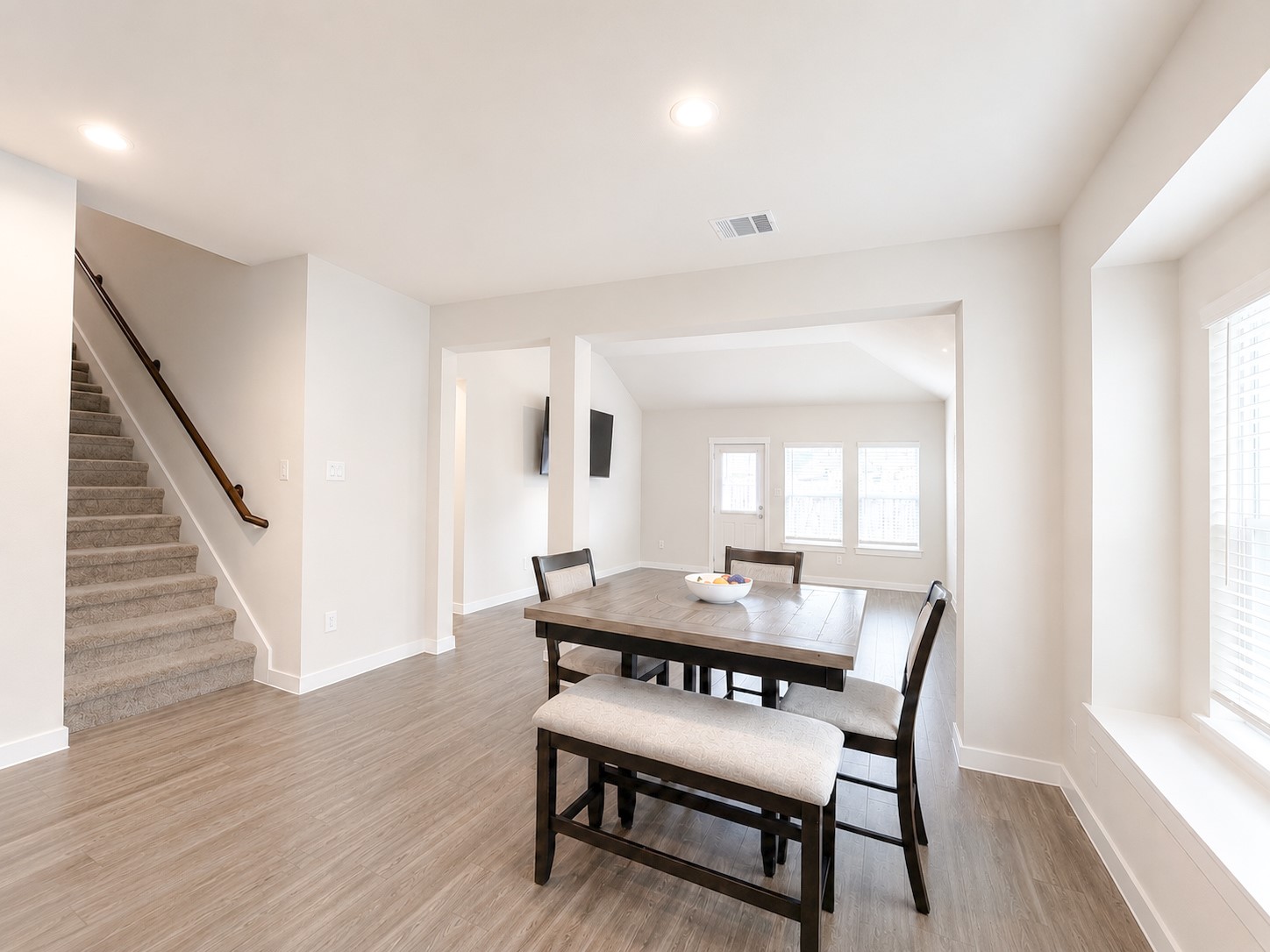 323 Bennett Street Angleton, TX 77515 - Photo 7 of 21 a dining room with furniture and wooden floor