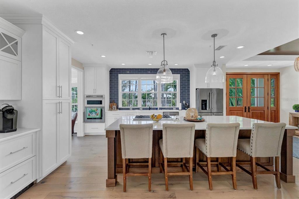 2425 24th Street West Boca Grande, FL 33921 - Photo 18 of 53 a view of a dining room with furniture window and outside view