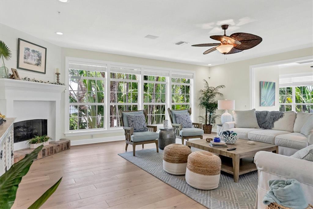 2425 24th Street West Boca Grande, FL 33921 - Photo 27 of 53 a living room with furniture and a fireplace