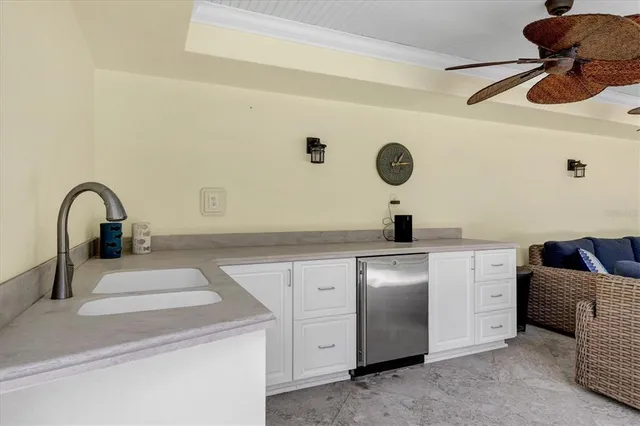 a view of a backyard with swimming pool