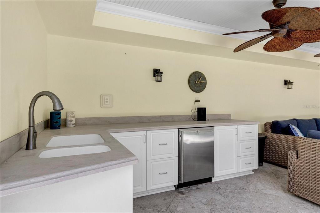 2425 24th Street West Boca Grande, FL 33921 - Photo 49 of 53 a bathroom with a sink and a mirror