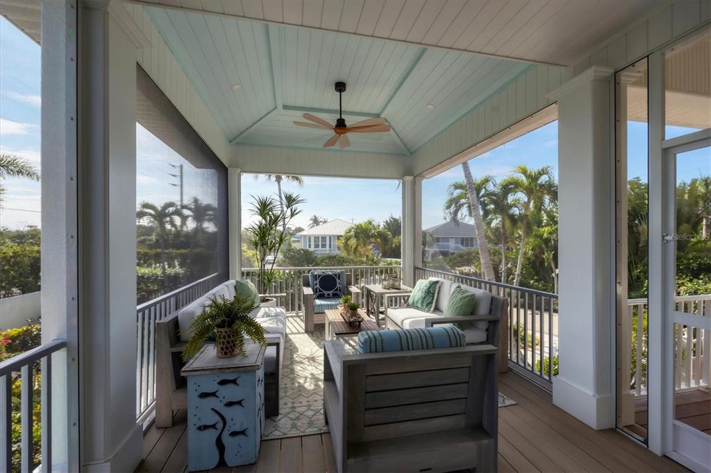 2425 24th Street West Boca Grande, FL 33921 - Photo 53 of 53 a view of a dining room with furniture window and outside view