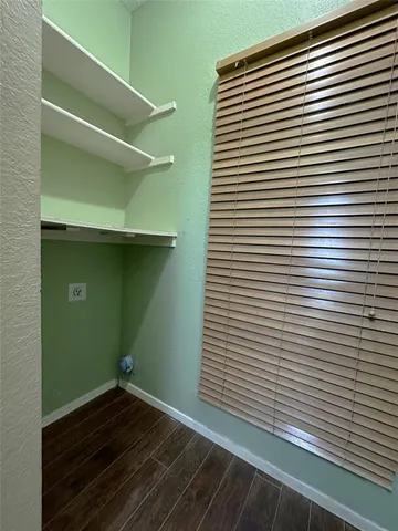 a view of a room with washing machine