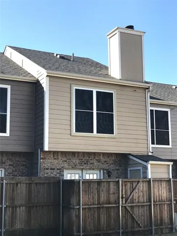a front view of a house with a balcony