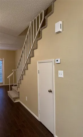a view of entryway with wooden floor