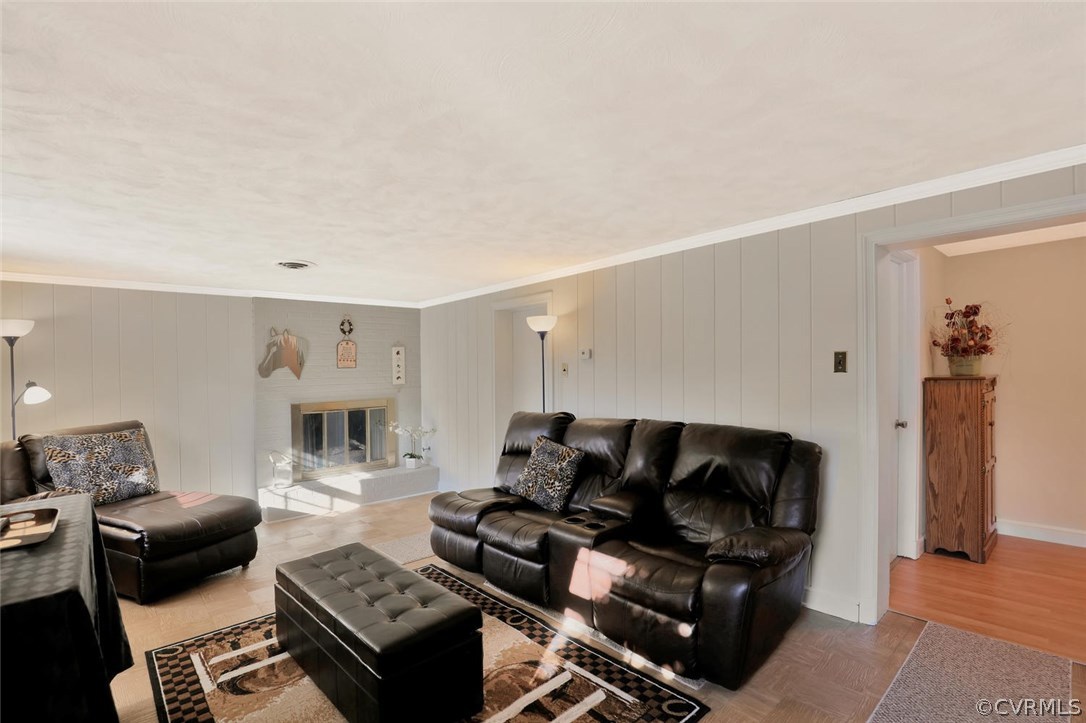 9320 Three Chopt Road Henrico, VA 23229 - Photo 15 of 32 a living room with furniture and a fireplace