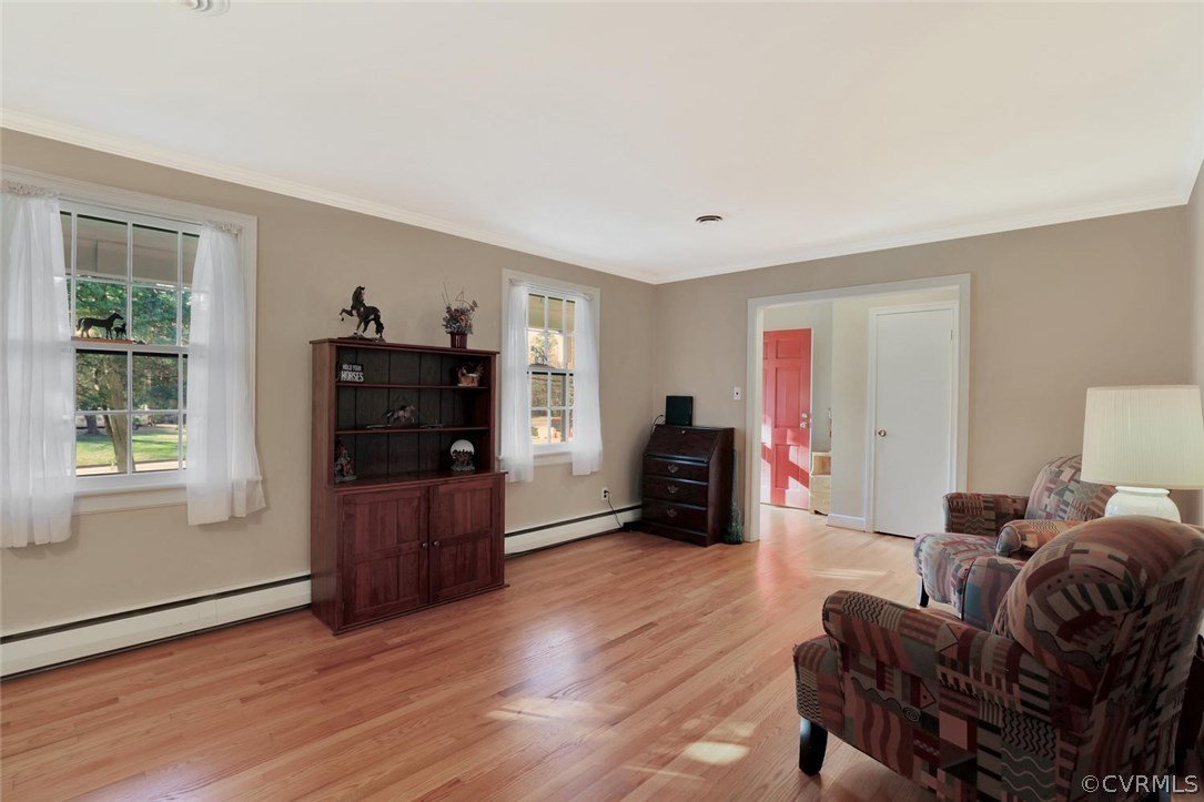 9320 Three Chopt Road Henrico, VA 23229 - Photo 5 of 32 a living room with furniture and a flat screen tv