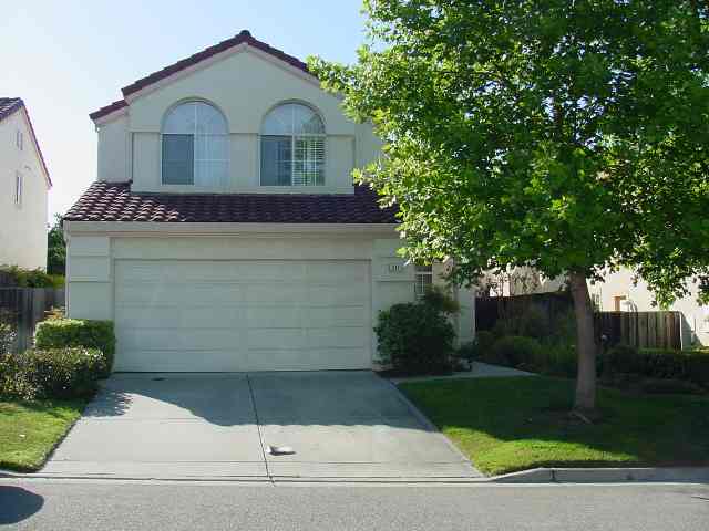 211 Firethorn Court San Ramon, CA 94582 - Photo 1 of 1 a front view of a house with garden
