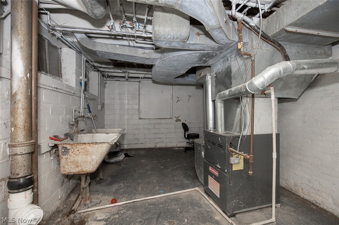 982 Roanoke Road Cleveland Heights, OH 44121 - Photo 31 of 33 Basement with sink.