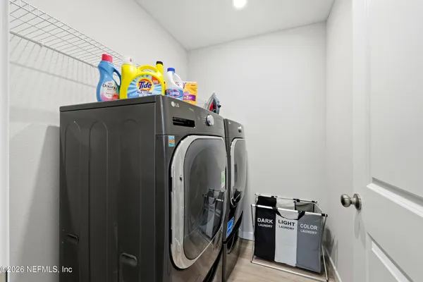 a utility room with dryer and washer