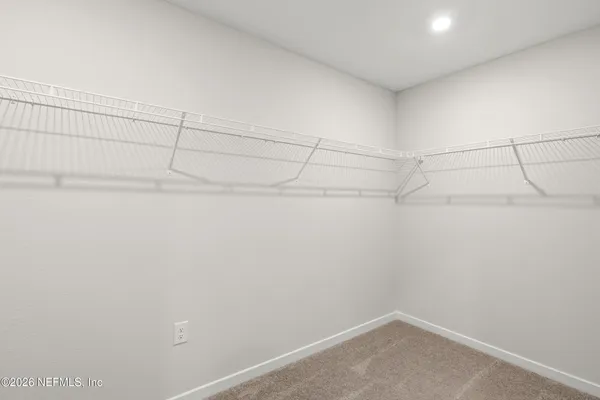 a view of a room with racks on the wall