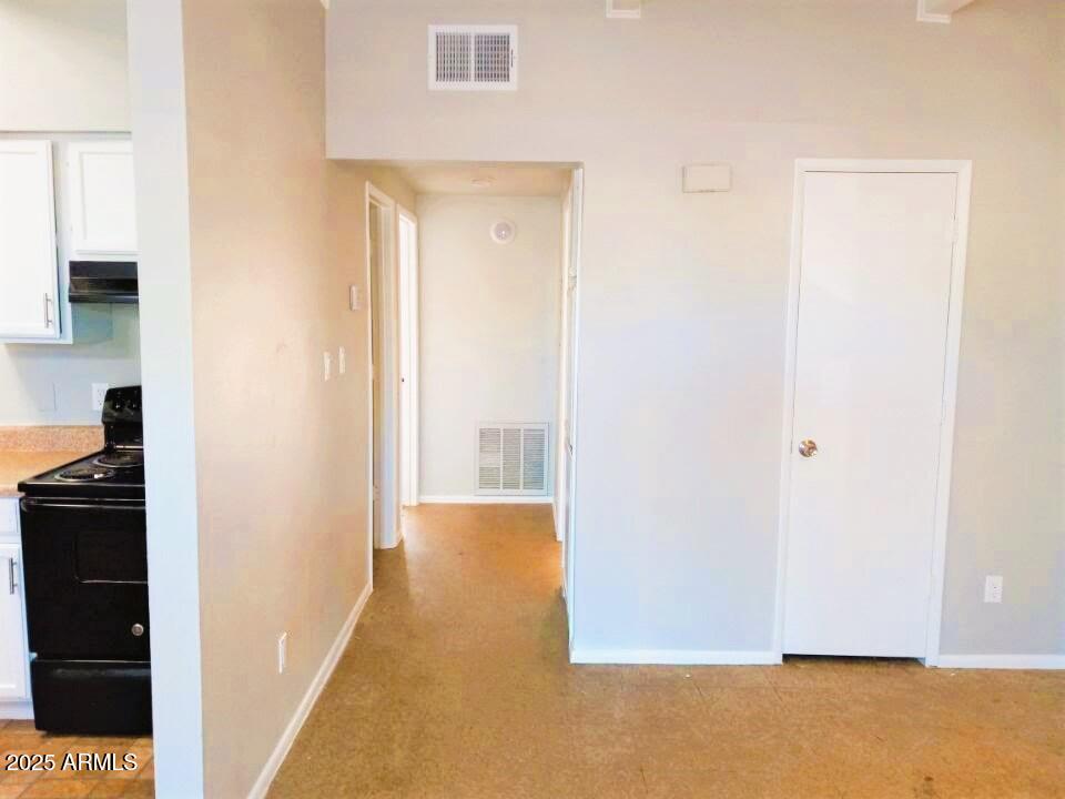 50 North Casa Grande Avenue, Unit 6 Casa Grande, AZ 85122 - Photo 5 of 9 a view of a bedroom from the hallway
