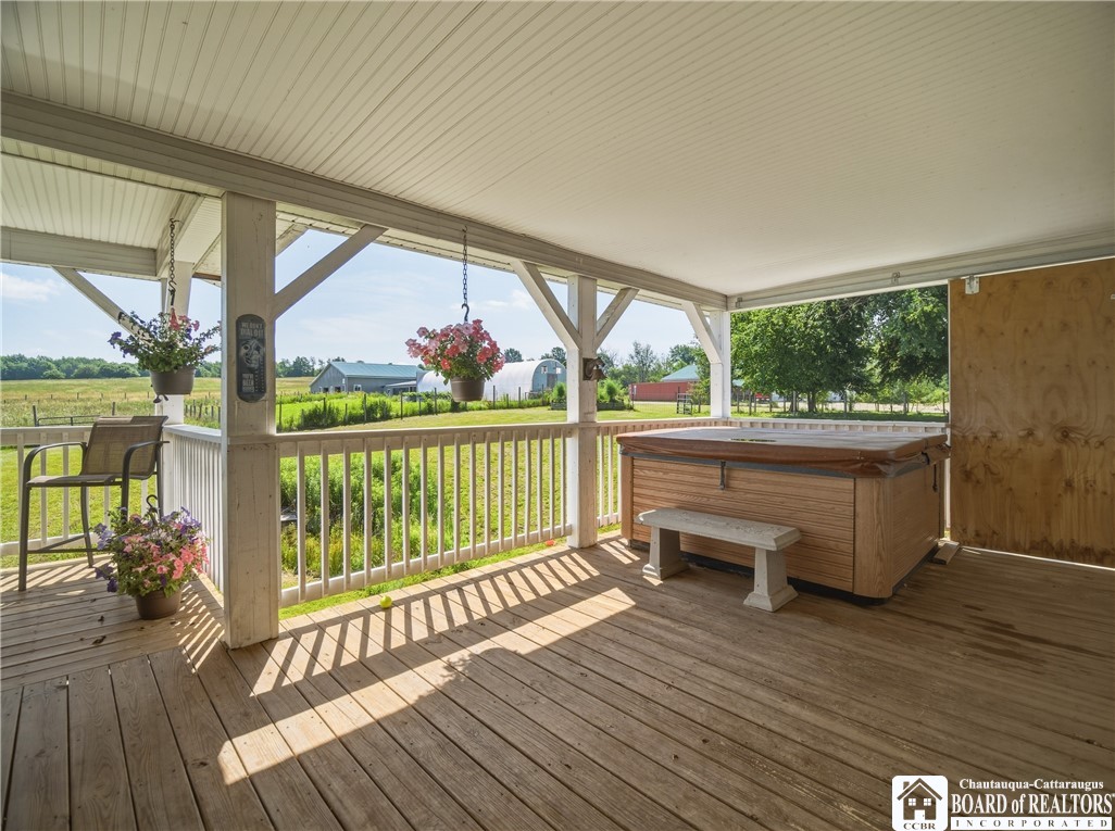 1546 Swede Road Harmony, NY 14710 - Photo 27 of 49 Back covered deck...hot tub. Full vinyl wrap for winter