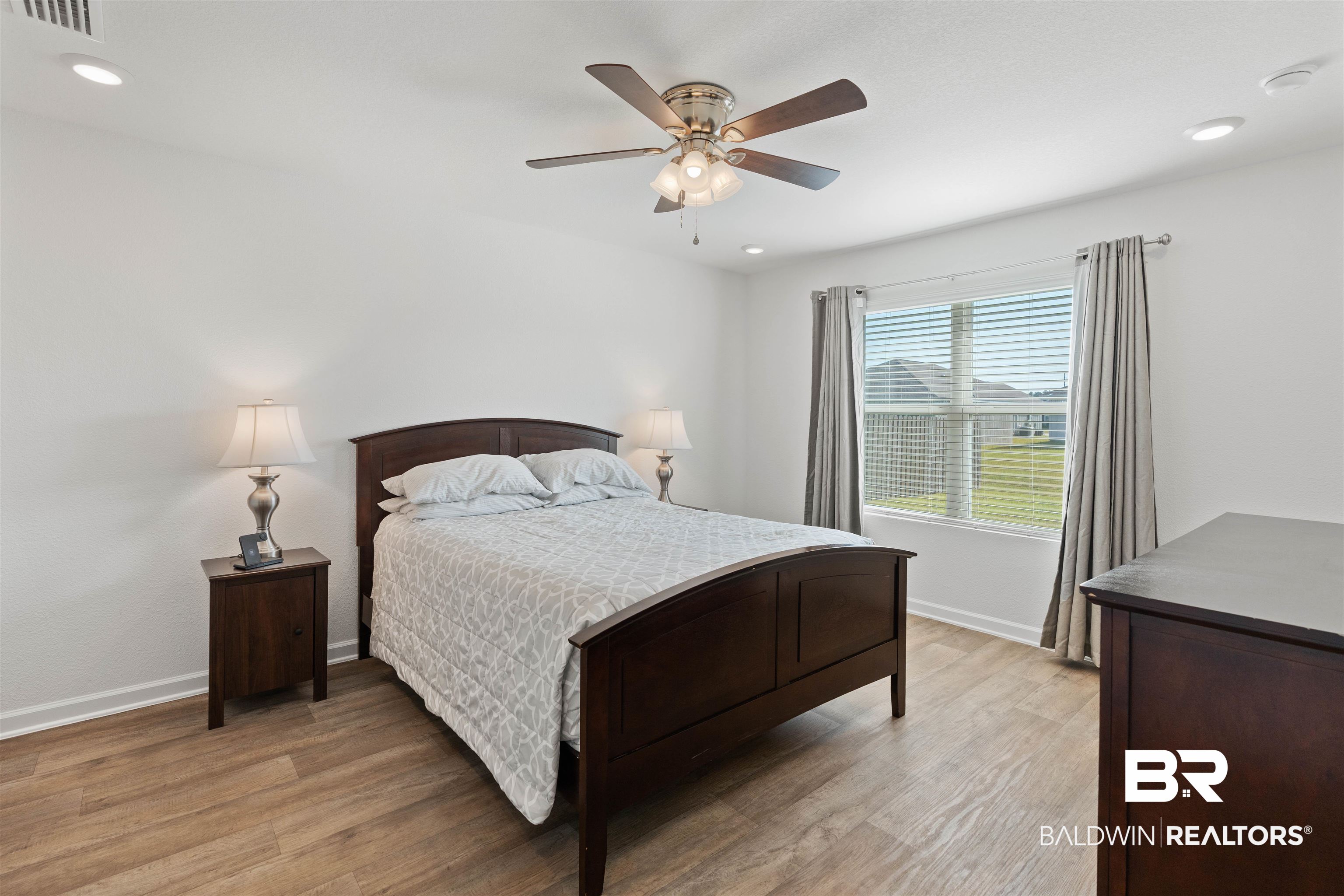 15030 Forsythia Loop Silverhill, AL 36576 - Photo 15 of 33 Bedroom with light wood-style floors, recessed lighting, and ceiling fan