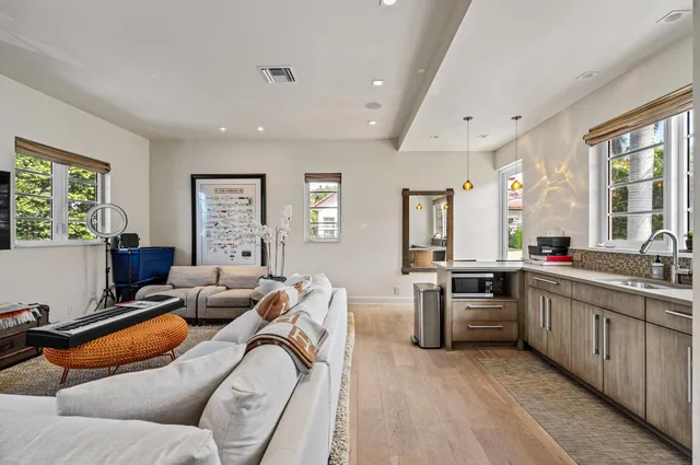 a bedroom with a bed and a desk