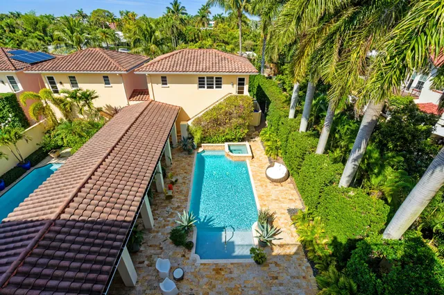 a view of a swimming pool with a patio