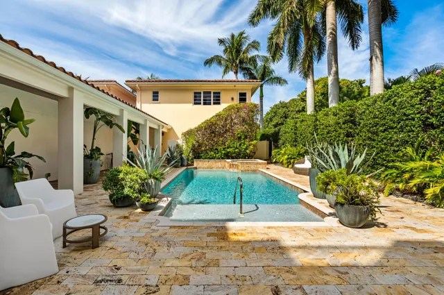 a view of a backyard of a house