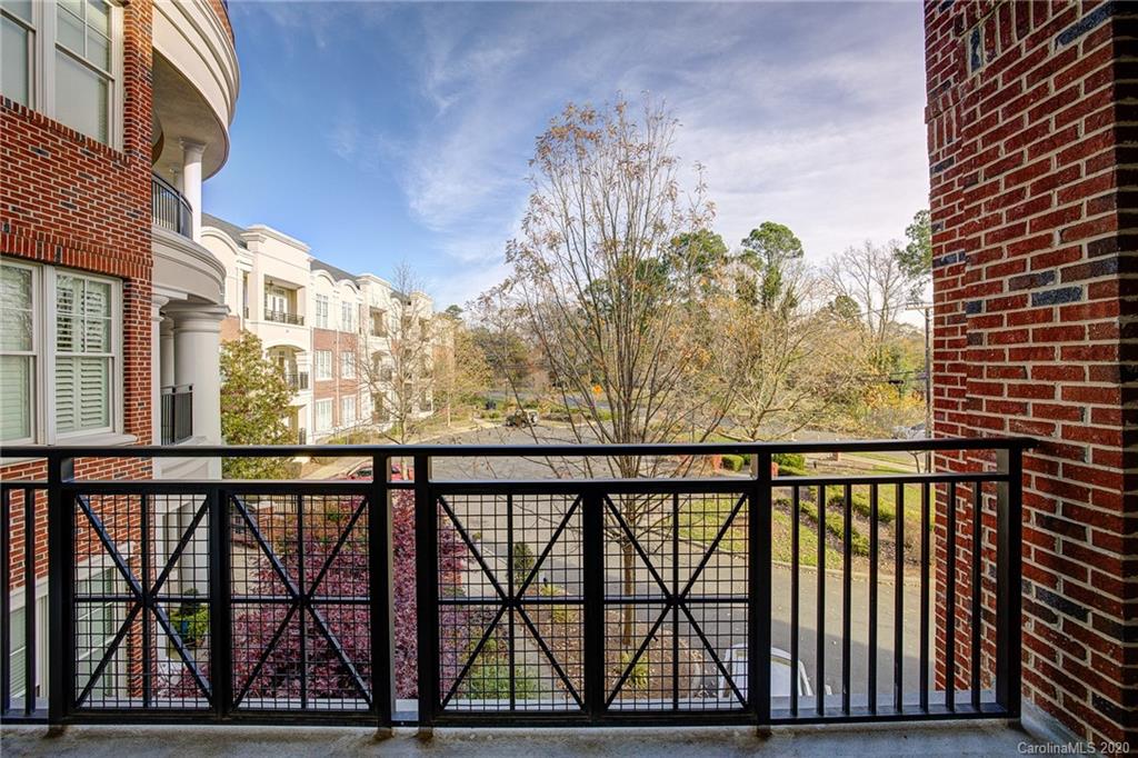 5425 Closeburn Road, Unit 212 Charlotte, NC 28210 - Photo 12 of 14 a view of a balcony with an outdoor space