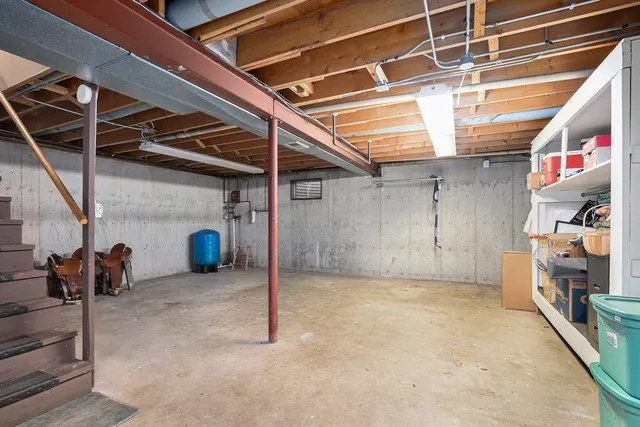 a view of a living room hardwood floor and furniture