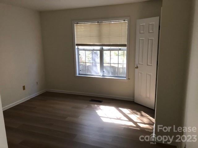 6717 Bevington Ridge Road, Unit A Charlotte, NC 28277 - Photo 14 of 15 an empty room with a window