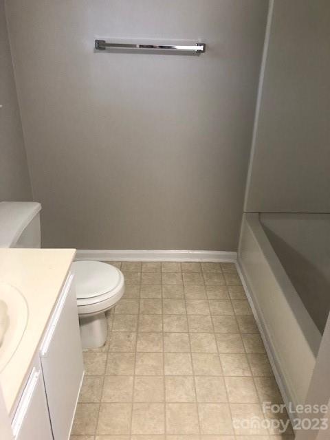 6717 Bevington Ridge Road, Unit A Charlotte, NC 28277 - Photo 10 of 15 a bathroom with a toilet and a tub