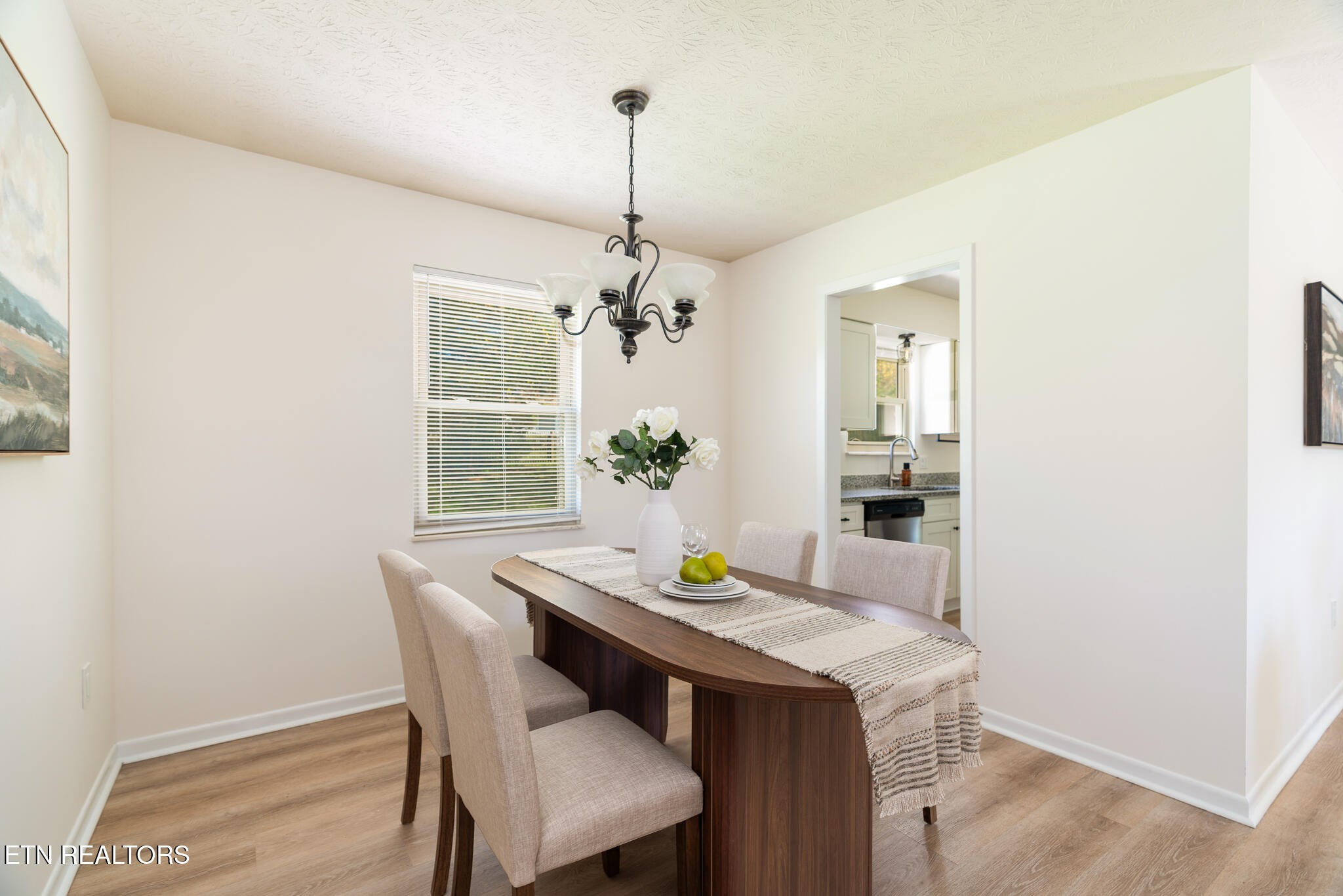520 Harrow Road Knoxville, TN 37934 - Photo 12 of 42 a view of a dining room with a table and chairs