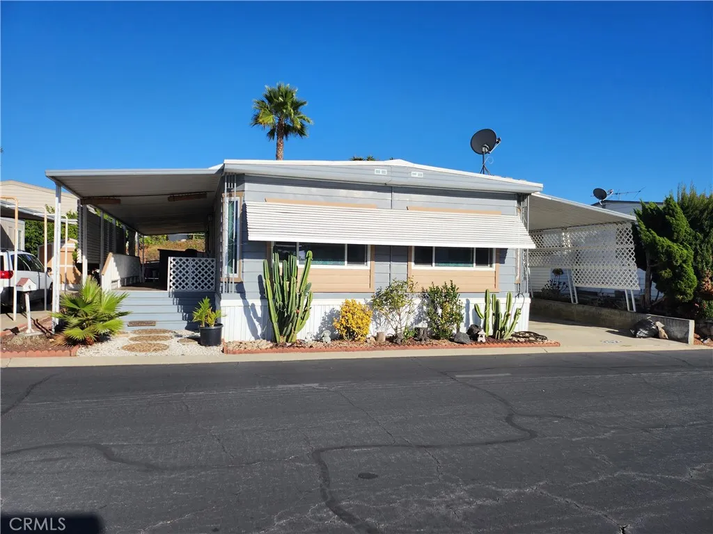 a front view of a building with yellow lighting