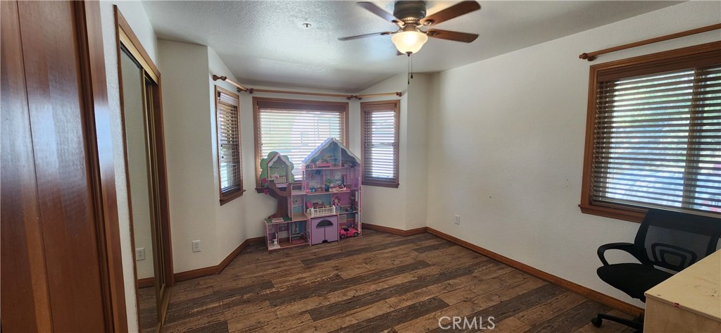 29932 Louis Avenue Canyon Country, CA 91351 - Photo 15 of 46 a bedroom with a bed and a window