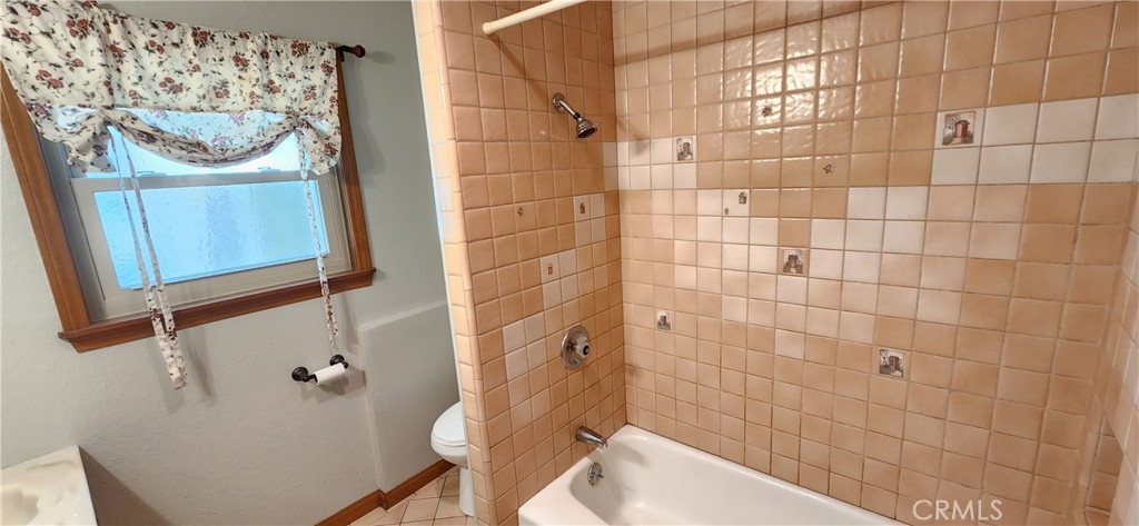 29932 Louis Avenue Canyon Country, CA 91351 - Photo 18 of 46 a bathroom with a bathtub and shower