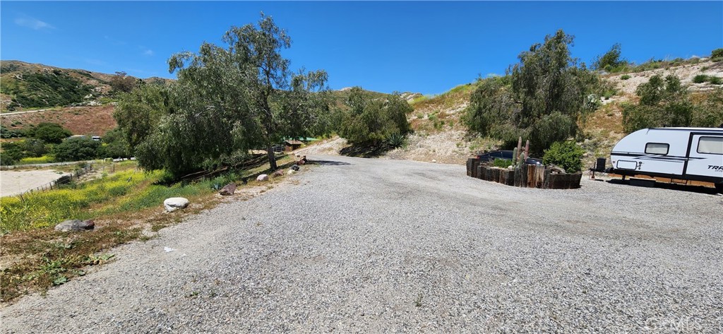 29932 Louis Avenue Canyon Country, CA 91351 - Photo 3 of 46 a view of a car parked on the road